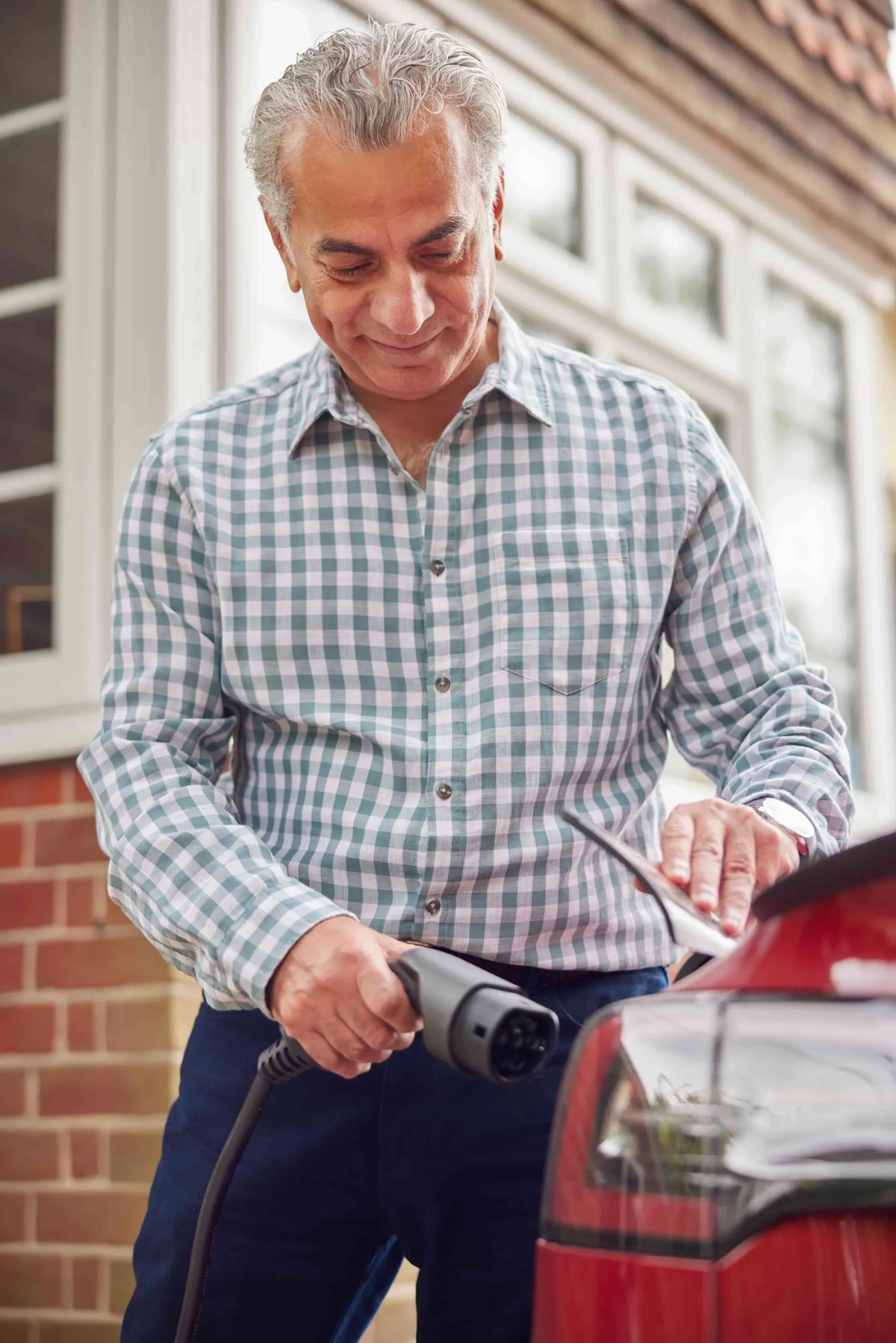 How to Charge an Electric Car at Home: Cost, Speed & Setup